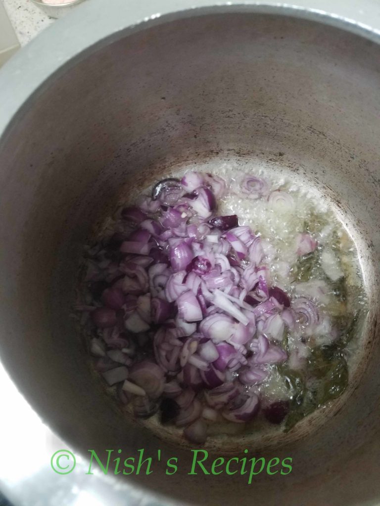 Saute onion for Poondu Kulambu