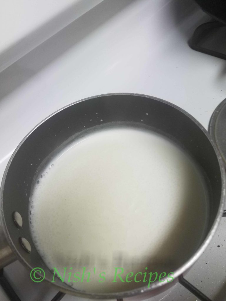 Boil milk for Milk Paayaasam