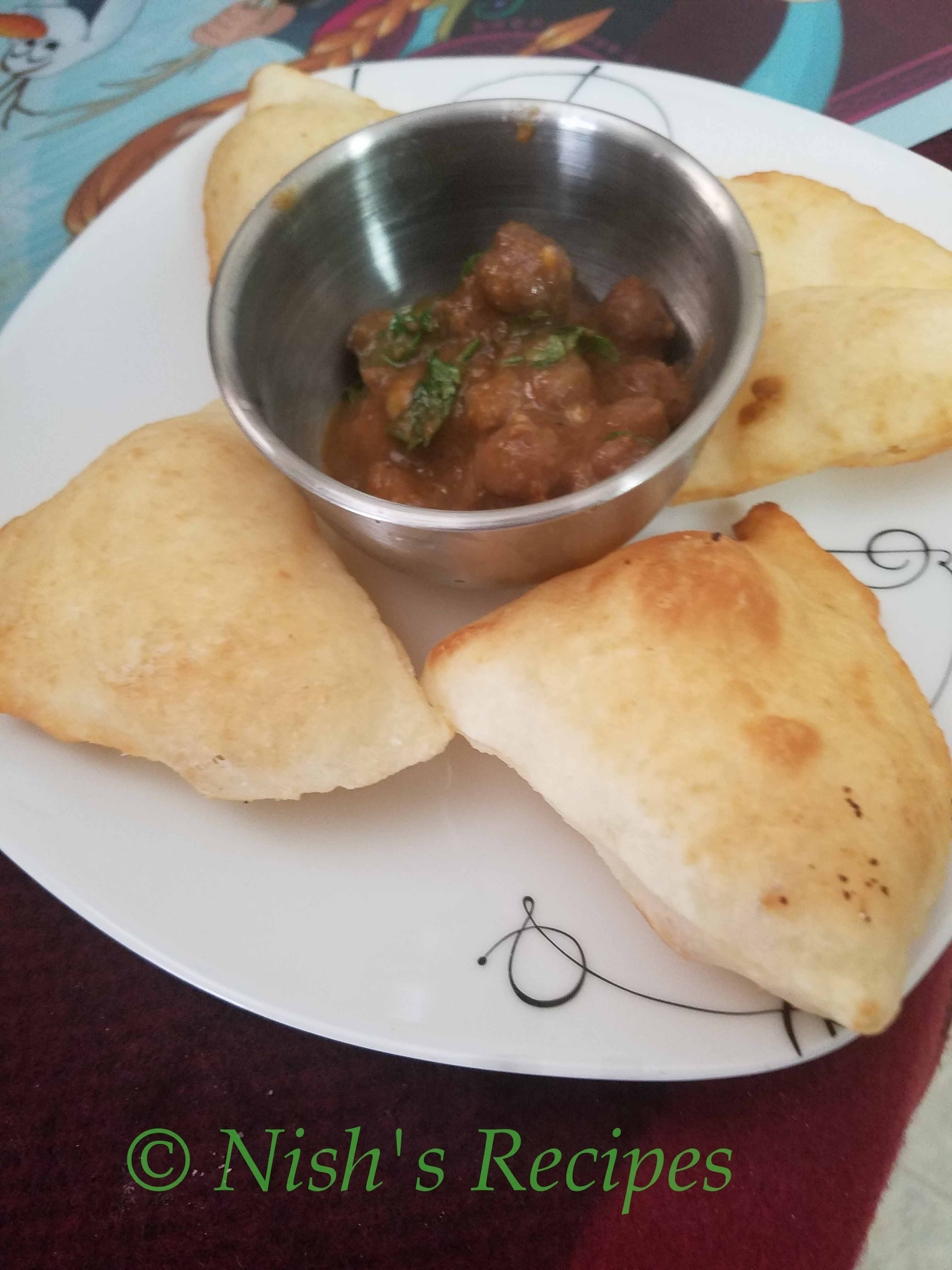 Serve Bhatura with channa