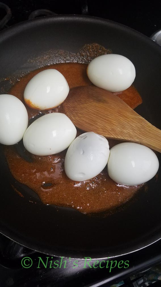 Add egg to masala for Egg Curry